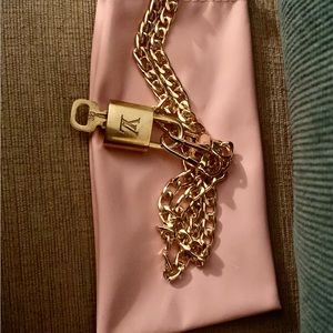 Authentic Louis Vuitton Lock & Key on a Non brand Chain.
